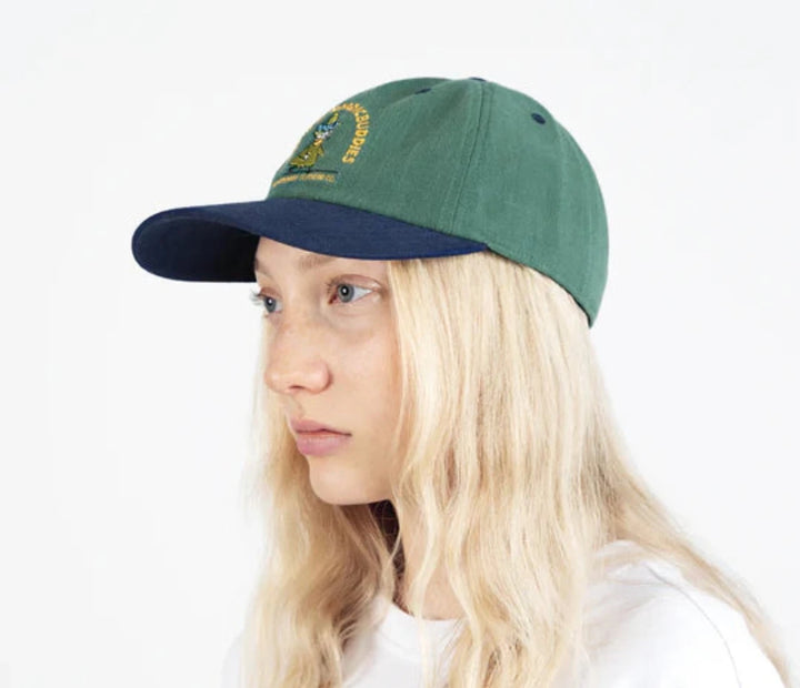 Moomin Nuuskamuikkunen Seikkailu dad cap green/navy - Shop-Tetuan