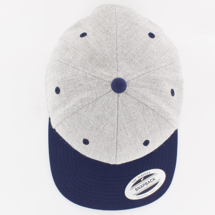 The Classics Yupoong snapback heather/navy - Shop-Tetuan