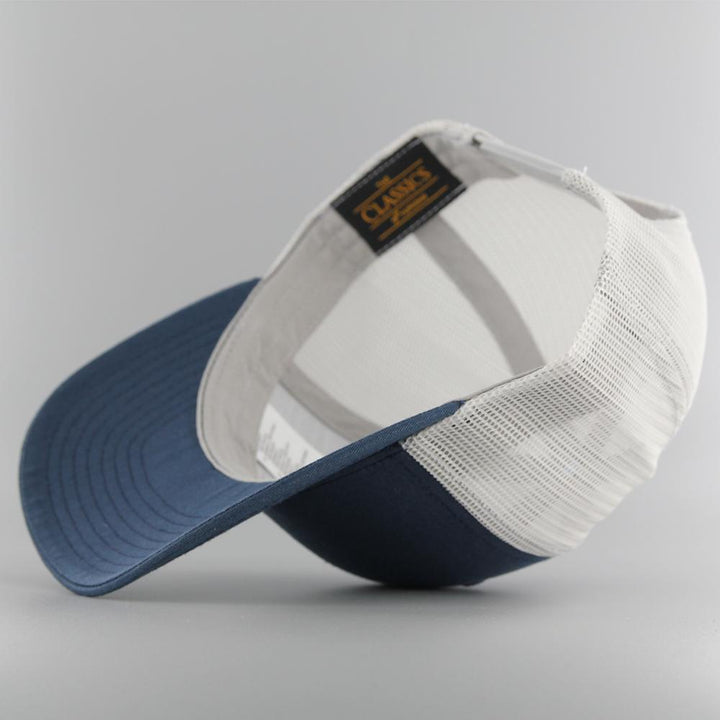 The Classics Yupoong Retro trucker 2-tone cap navy/silver - Shop-Tetuan