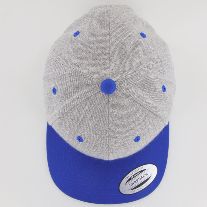 The Classics Yupoong snapback heather/royal - Shop-Tetuan